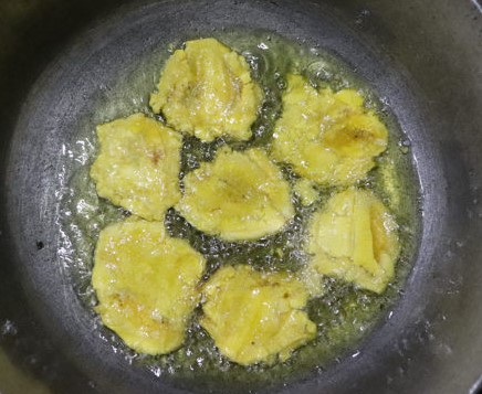 Flatten cooked plantain slices